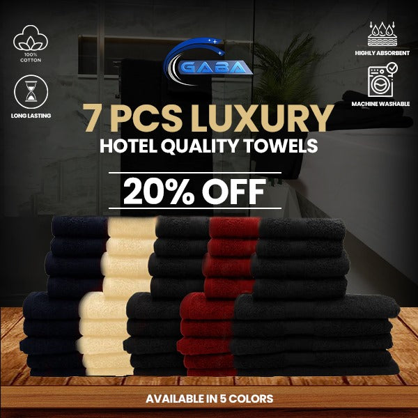 Stack of luxury hotel quality towels with Gaba brand logo and promotional text.